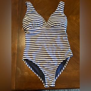 Antiqua horizontal navy blue and white one piece swimsuit.